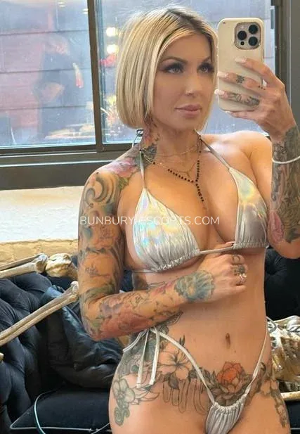 Bunbury escorts Leslie — 5
